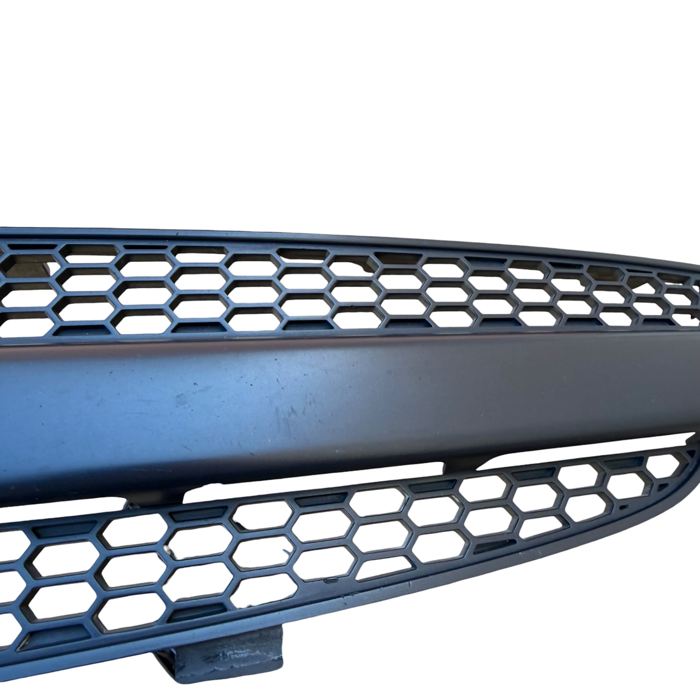 Holden VZ front grille close-up showing scratches and cosmetic marks on second-hand part